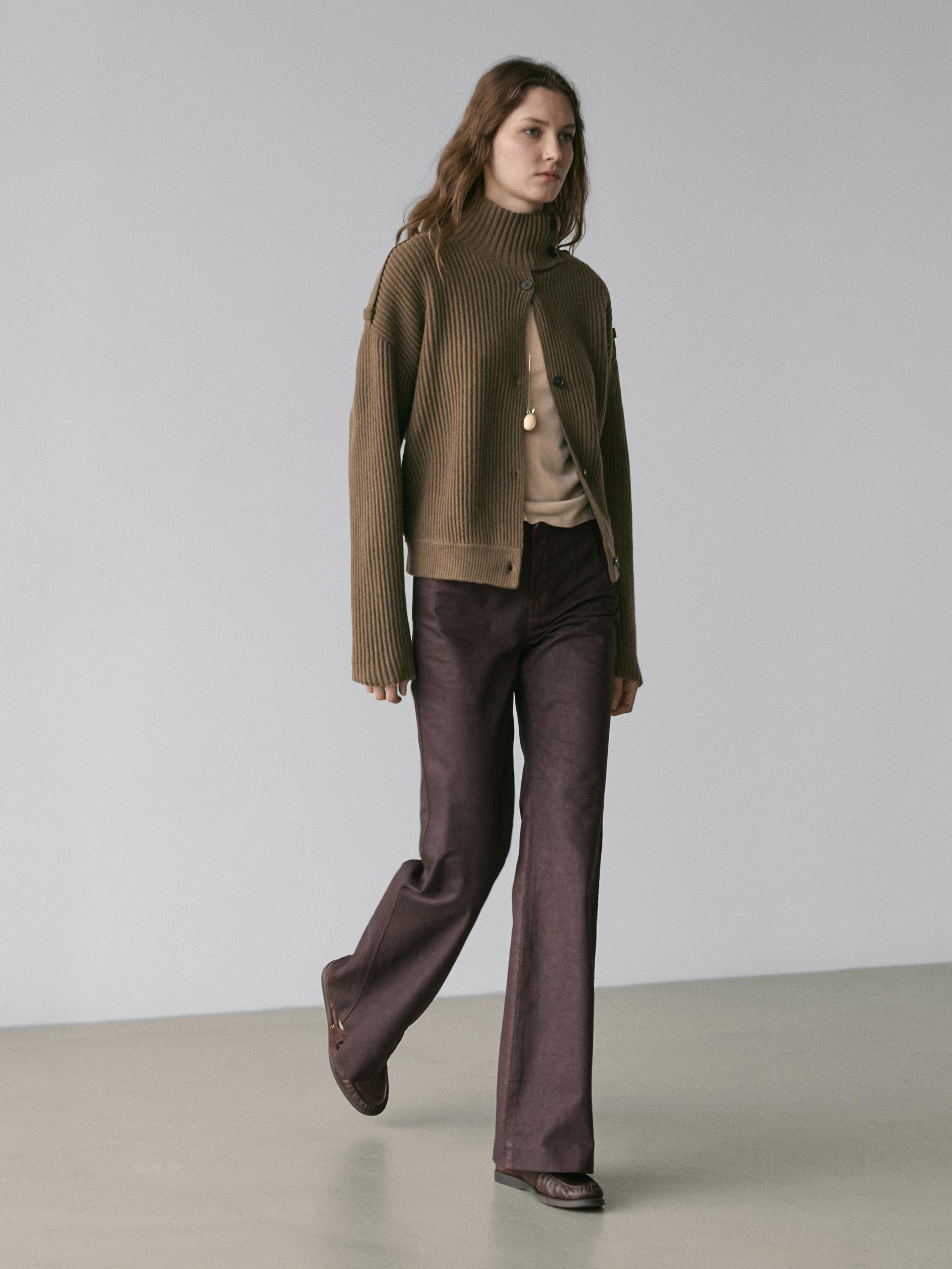 Waxed flare fit trousers